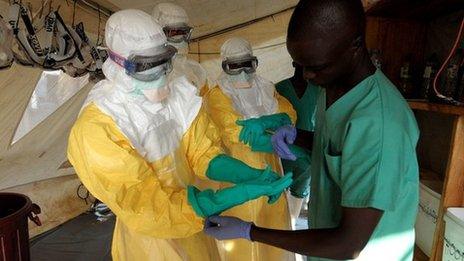 Health workers in isolation ward, southern Guinea (1 April)