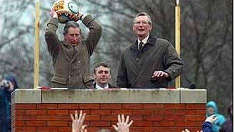 Prince Charles turning up Ashbourne Shrovetide plinth 2003