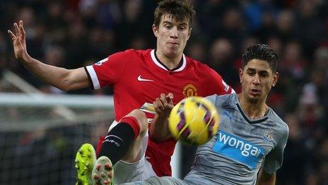 Paddy McNair challenges Newcastle United's Ayoze Perez