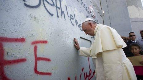 Pope Francis touches the wall that divides Israel from the West Bank (25 May 2014)