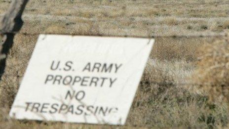 A barbed wire fence surrounding the US Army Dugway Proving Ground in the middle of Rush Valley in the western desert of Utah, USA (28 May 2015)