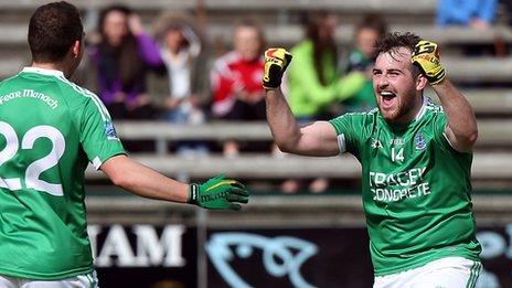 Sean Quigley celebrates scoring the late penalty against Antrim