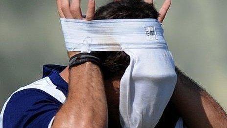 Man wearing a jockstrap on his head