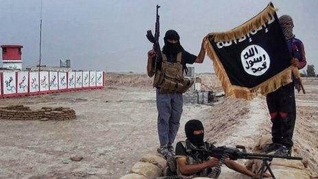 ISIS fighters at an Iraqi army checkpoint in Salahuddin (12/06/14)