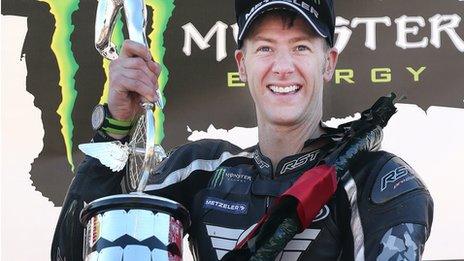 Ian Hutchinson wins an emotional Supersport TT race on the Isle of Man