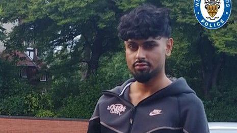 Ismail Younis, 24, wearing a dark coloured Nike hoodie