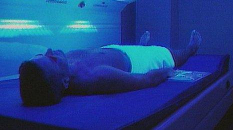 Man on sunbed