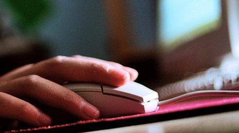 Teenager using a computer