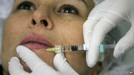 A woman having a botox injection