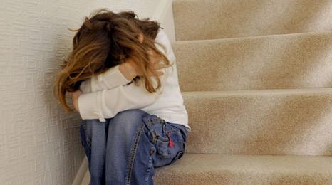 Depressed young girl portrayed by an actress