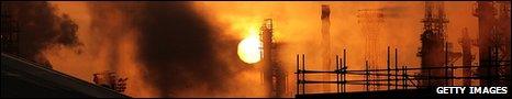 Sunrise over an oil refinery