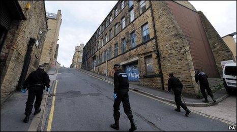 Police search an area of Bradford