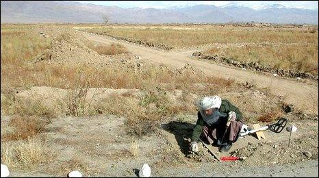 A man removing mines from the war zone in Afghanistan