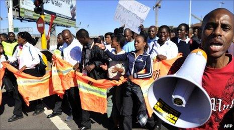 Protesters demonstrate against the 2010 World Cup in central Durban, South Africa, on 16 June, 2010 protesting lavish spending on the World Cup