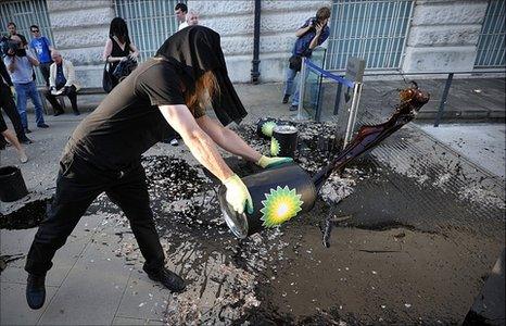 Protesters carried drums with the BP logo before pouring the contents on to the entrance of Tate Britain.