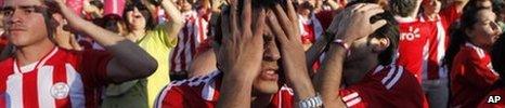 Fans in Asuncion react after Spain scored against Paraguay