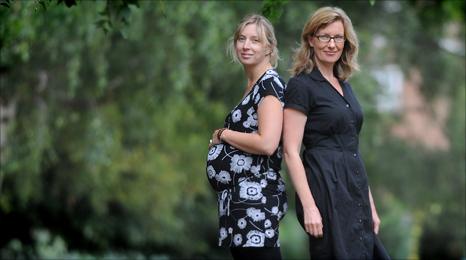 One pregnant, one not (picture posed by models)