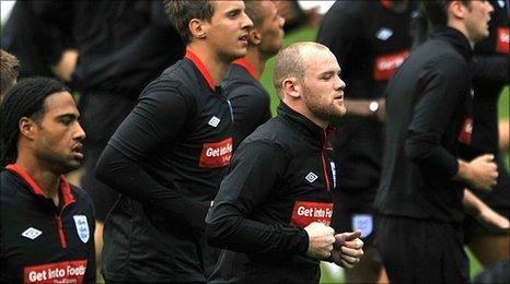Wayne Rooney trains with his England team-mates in Basle