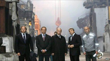 Russian Prime Minister Vladimir Putin (centre) visits Norilsk Nickel's copper plant in the Arctic city of Norilsk