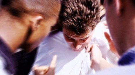 Boy being bullied - posed photo