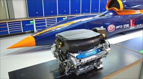 The Cosworth Formula One engine next to the Bloodhound.