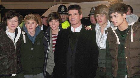 One Direction with Simon Cowell