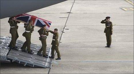 The body of L/Cpl Tasker and the ashes of Theo werre flown to RAF Lyneham in Wiltshire (Pic: Crown Copyright/MOD 2011)
