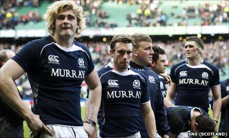 Scotland players look on dejectedly after the loss to England at Twickenham
