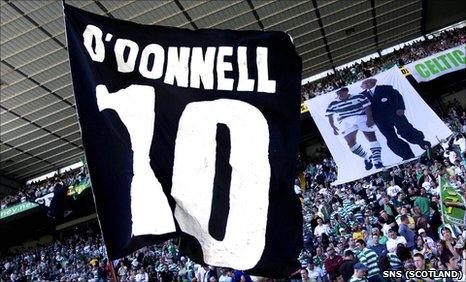 Supporters pay homage to Phil O'Donnell