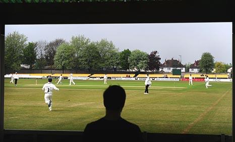 A spectator watches play during day three of the Division Two LV County Championship match beteen Leicestershire and Derbyshire at Grace Road