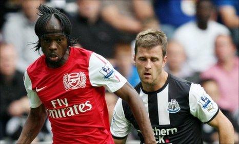 Arsenal striker Gervinho and Newcastle defender Ryan Taylor