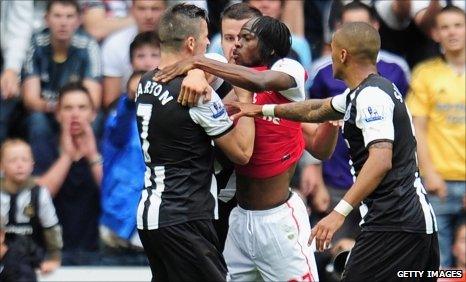 Newcastle's Joey Barton (left) and Arsenal's Gervinho