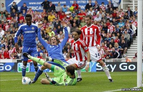 John Mikel Obi (left) in action for Chelsea against Stoke City on Sunday