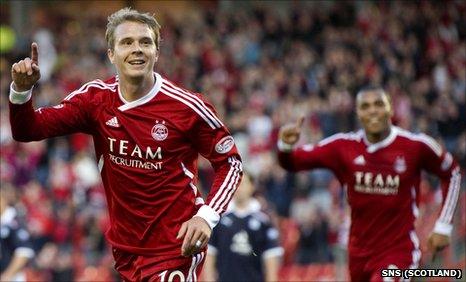 Darren Mackie celebrates scoring for Aberdeen against Dundee