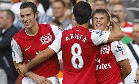 Arteta and Arshavin (right)