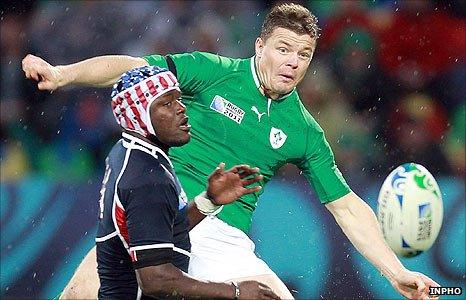 USA winger Takudzwa Ngwenya in action against Irish skipper Brian O'Driscoll