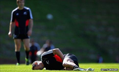 Dan Carter shows the pain after suffering a groin injury in training