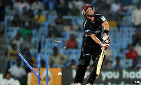 Roelof van der Merwe is bowled by Lasith Malinga