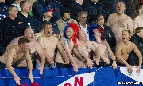 The Scotland fans cheer on their team in Liechtenstein