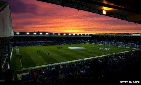 Elland Road stadium at sunset