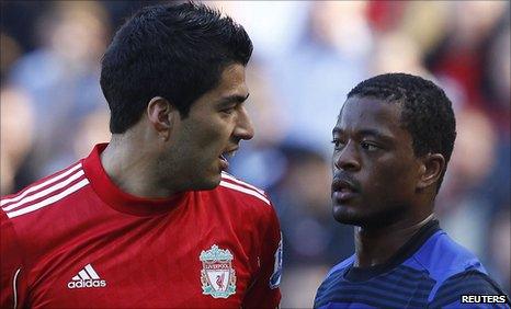 Luis Suarez and Patrice Evra