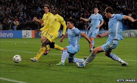 Sergio Aguero of Manchester City scores his team's second goal