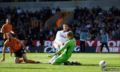 Danny Graham slots Swansea ahead