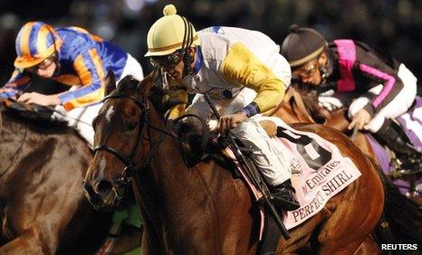 John Velazquez (centre) rides Perfect Shirl to victory