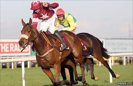 Davy Russell celebrates as Quito De La Roque beats Sizing Europe