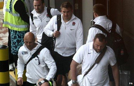 England players at Heathrow