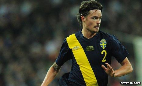 Mikael Lustig in action for Sweden