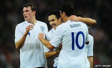 England celebrate scoring against Sweden