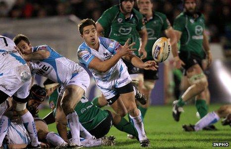 Rhys Webb passes from a ruck