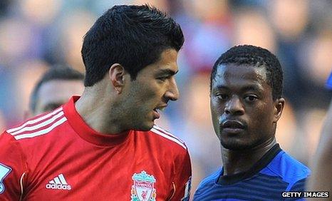 Luis Suarez and Patrice Evra